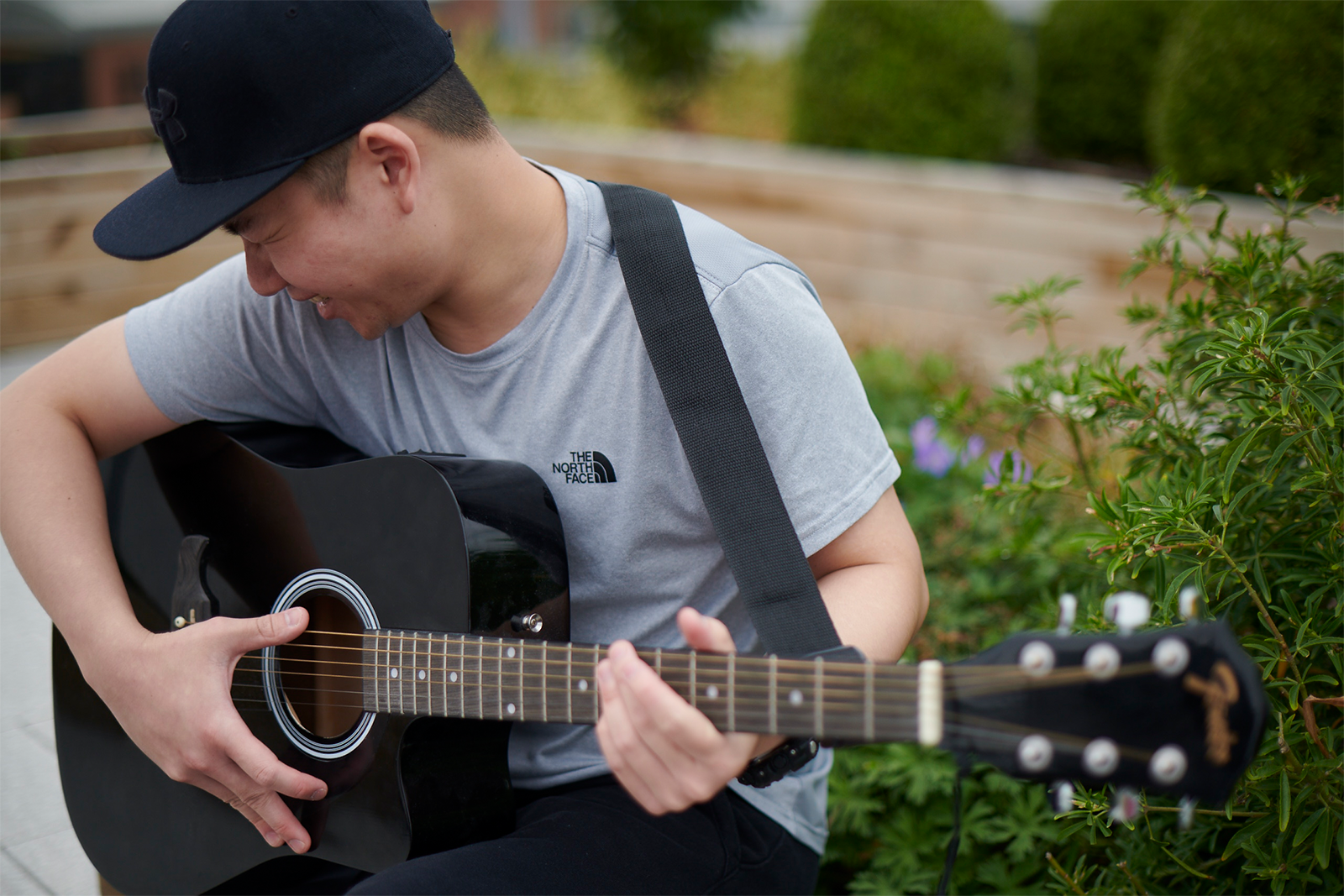 Student playing the guitar