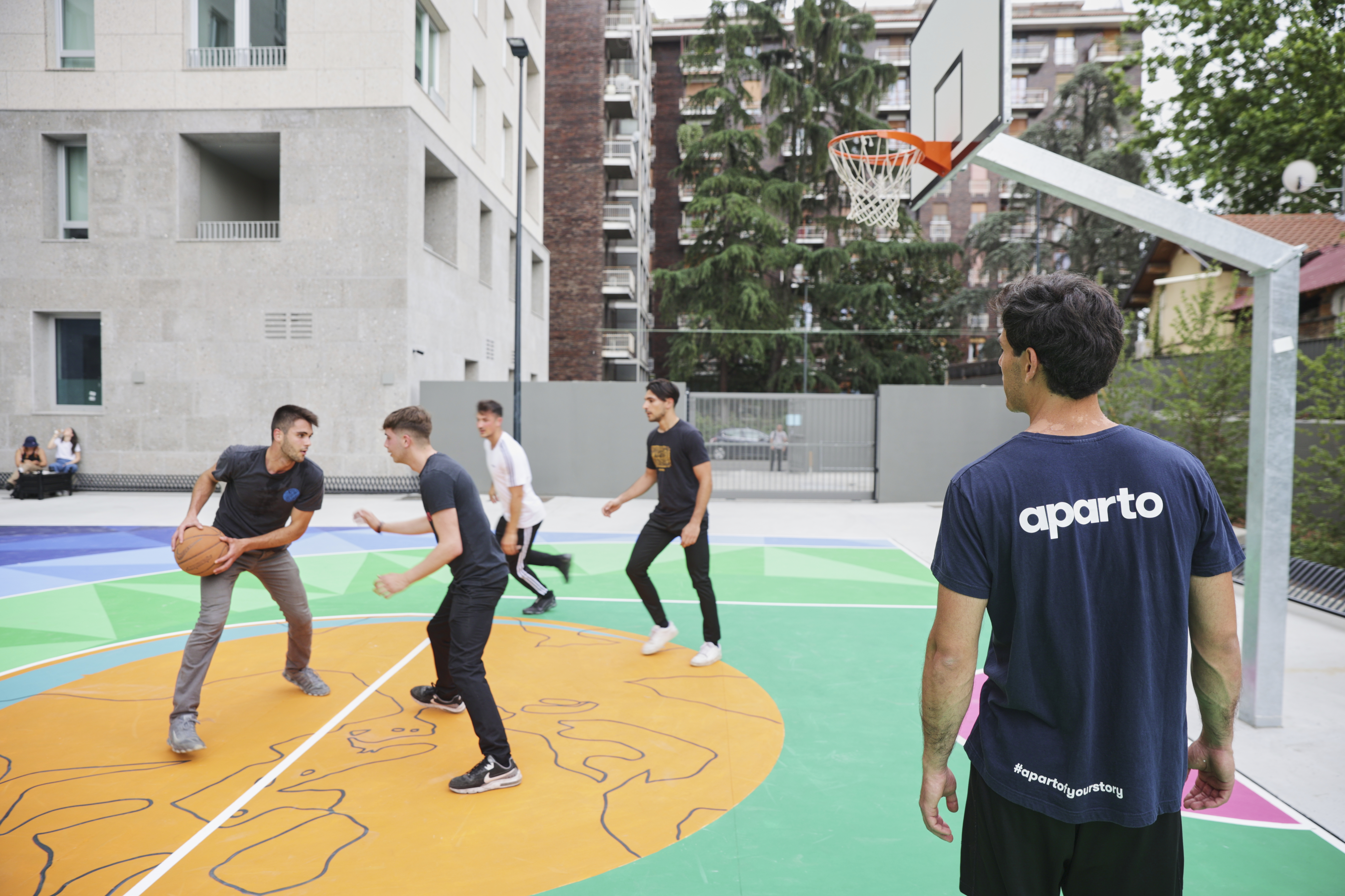 students playing basketball